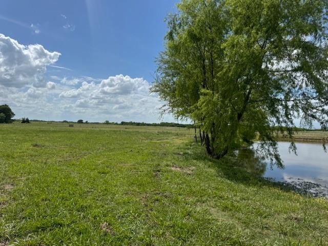 600 Barnes Mabank, TX 75147 - Photo 8 of 10 a view of a lake with a yard