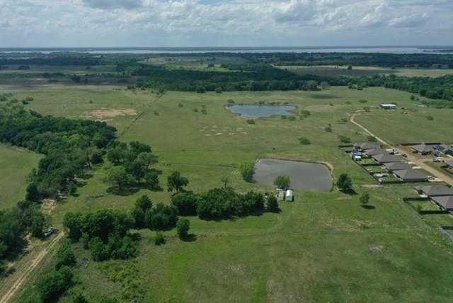 600 Barnes Mabank, TX 75147 - Photo 10 of 10 an aerial view of a houses with outdoor space and trees