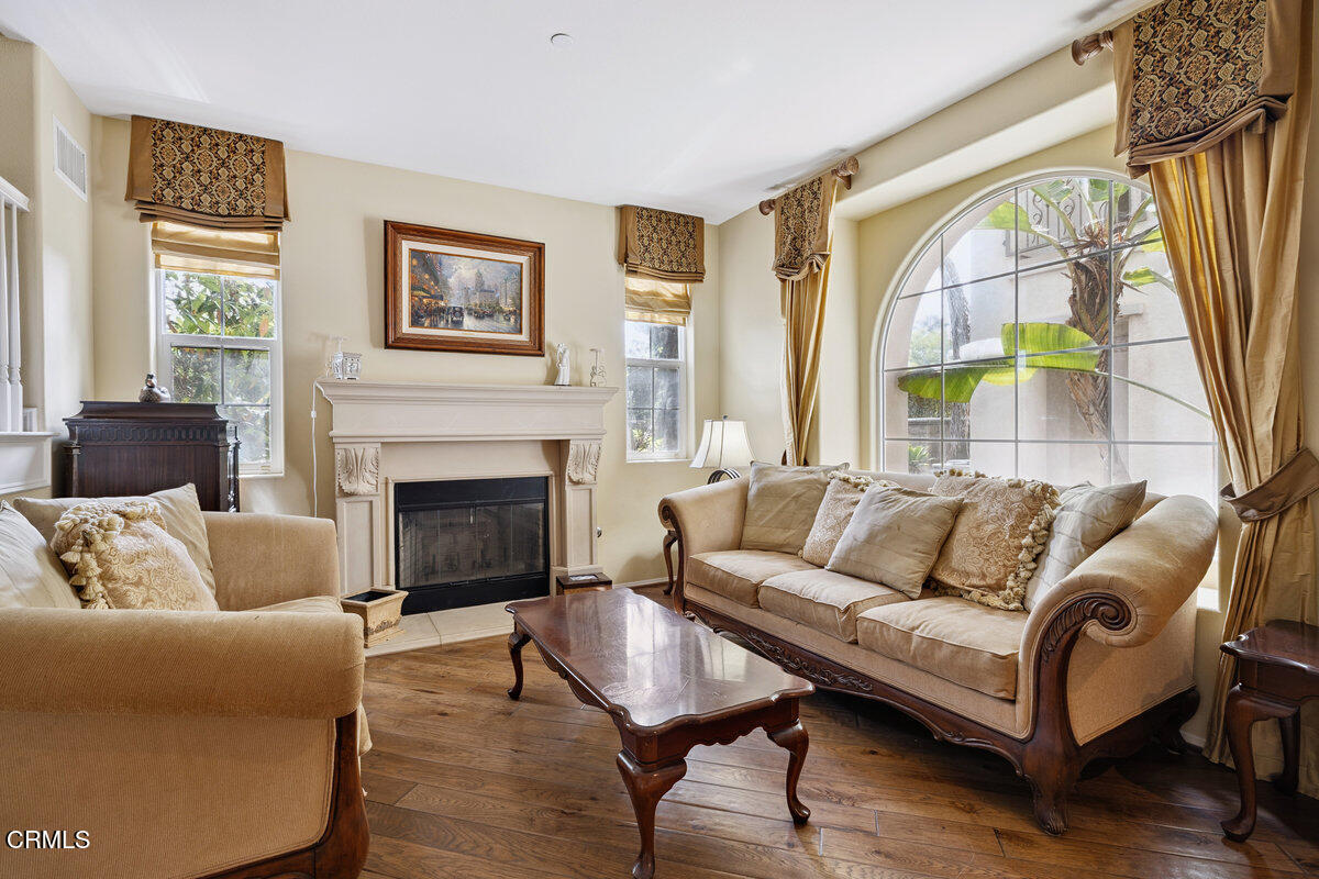 3401 Aviara Lane Oxnard, CA 93036 - Photo 13 of 55 a living room with furniture and a fireplace