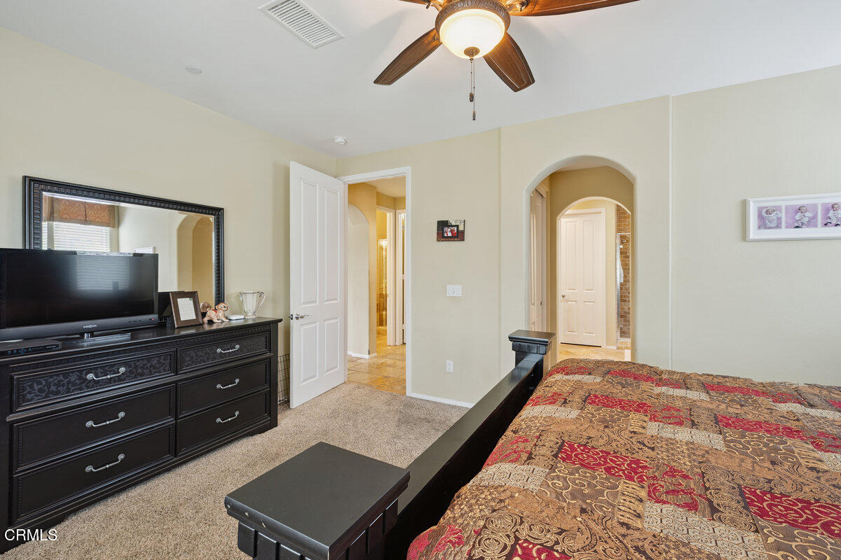 3401 Aviara Lane Oxnard, CA 93036 - Photo 18 of 55 a living room with furniture and a flat screen tv