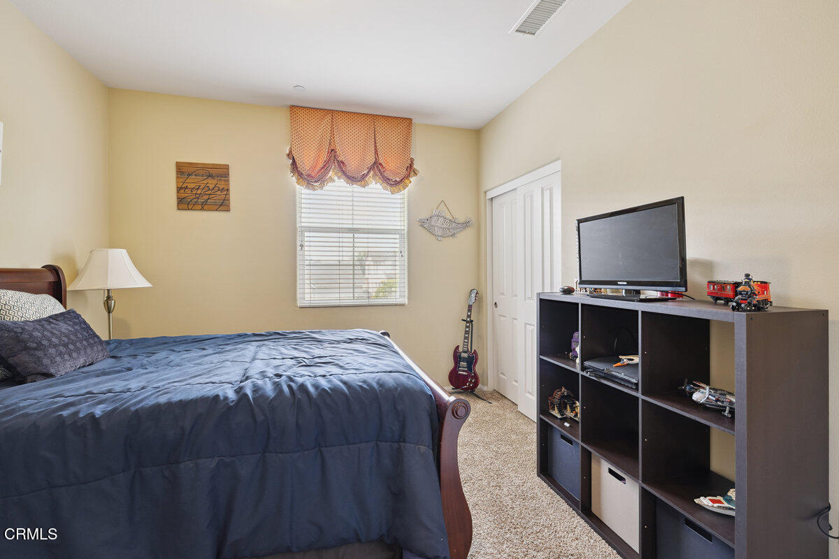 3401 Aviara Lane Oxnard, CA 93036 - Photo 26 of 55 a bedroom with a bed and a window