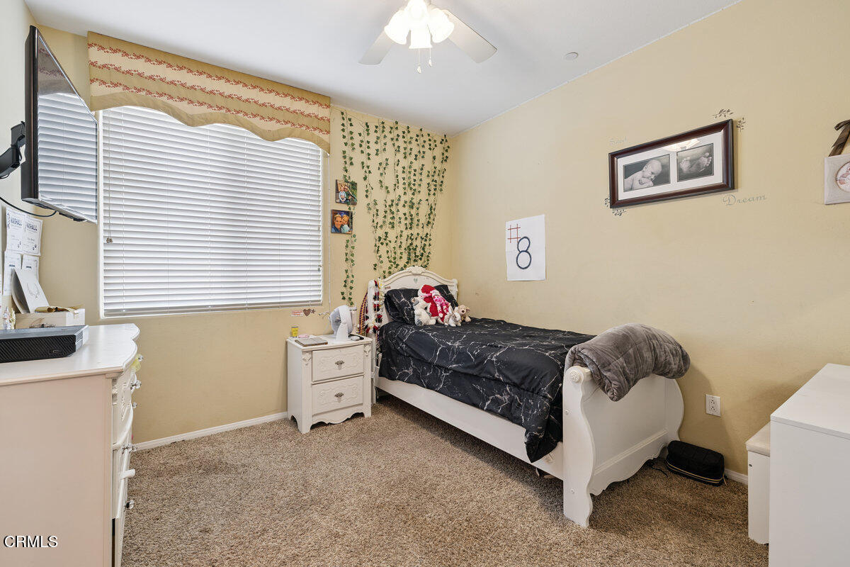 3401 Aviara Lane Oxnard, CA 93036 - Photo 27 of 55 a bedroom with a bed and a window
