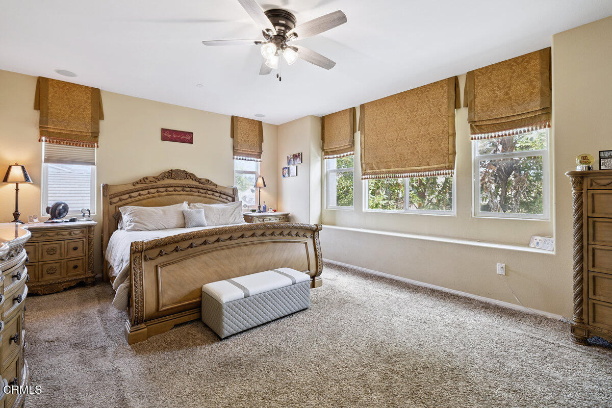 3401 Aviara Lane Oxnard, CA 93036 - Photo 31 of 55 a spacious bedroom with a bed and a window