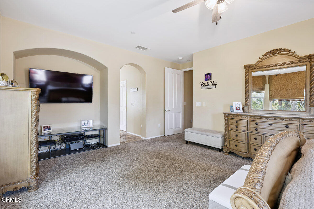 3401 Aviara Lane Oxnard, CA 93036 - Photo 32 of 55 a living room with furniture and a flat screen tv