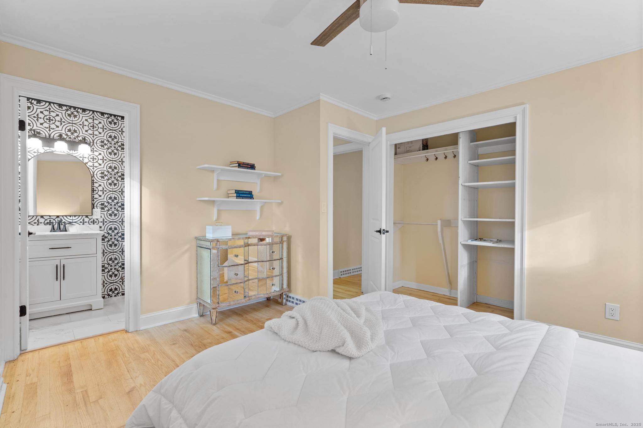 24 Evergreen Road North Branford, CT 06472 - Photo 22 of 31 a bedroom with a bed and a view of kitchen