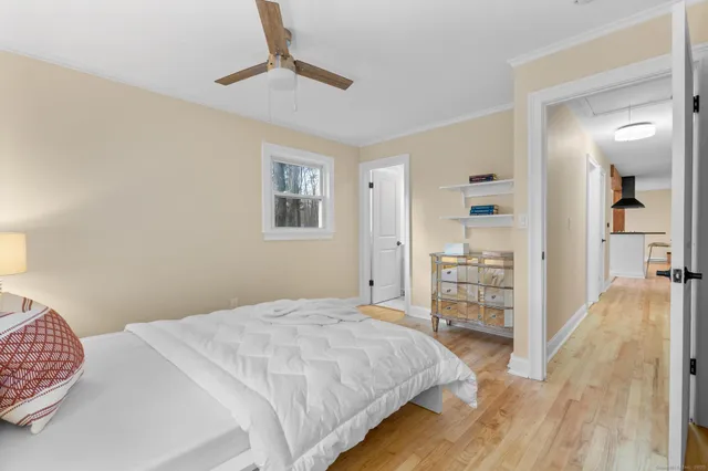 a bedroom with a bed and a cabinets