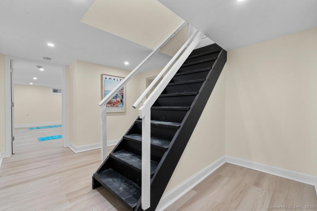 24 Evergreen Road North Branford, CT 06472 - Photo 25 of 31 a view of entryway and hall with wooden floor