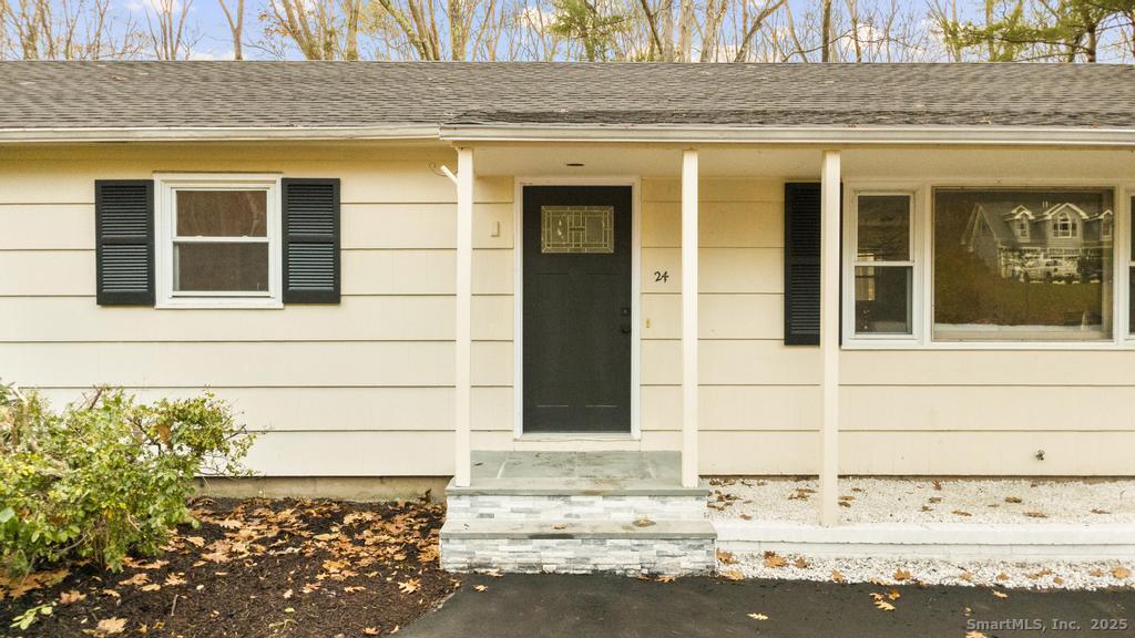 24 Evergreen Road North Branford, CT 06472 - Photo 3 of 31 a view of building with door