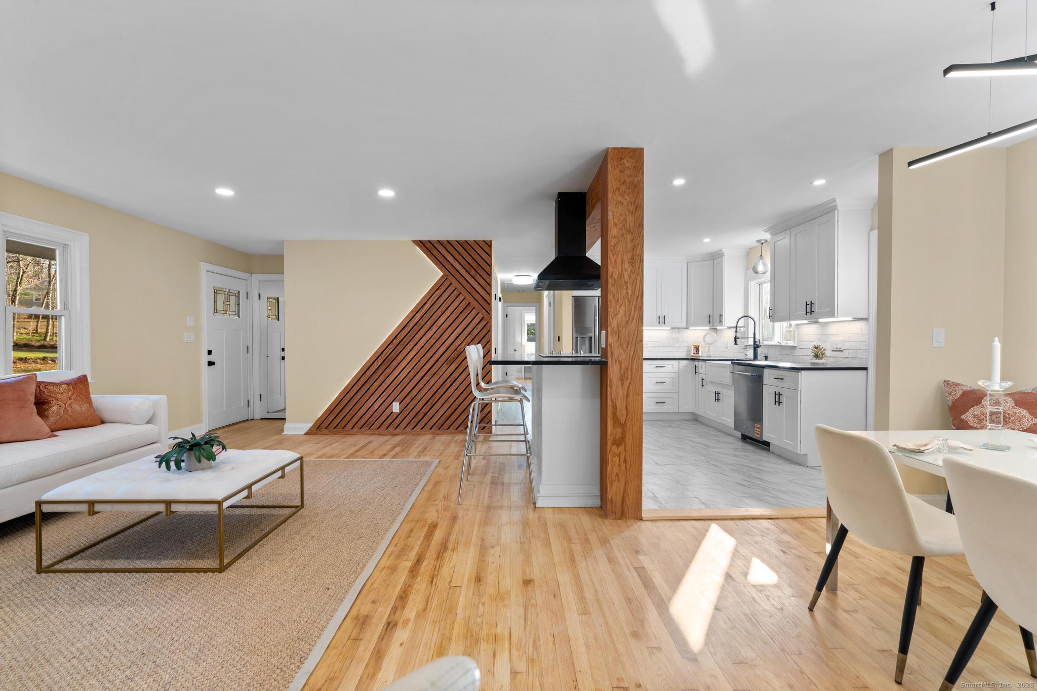 24 Evergreen Road North Branford, CT 06472 - Photo 5 of 31 a living room with furniture and wooden floor