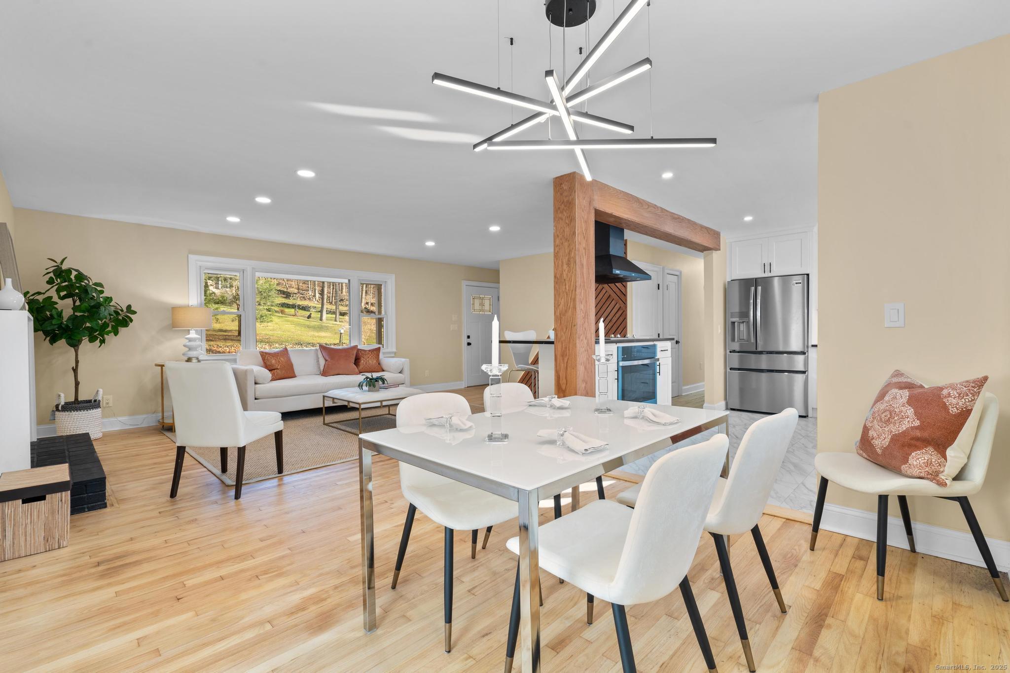 24 Evergreen Road North Branford, CT 06472 - Photo 6 of 31 a view of a dining room with furniture window and wooden floor