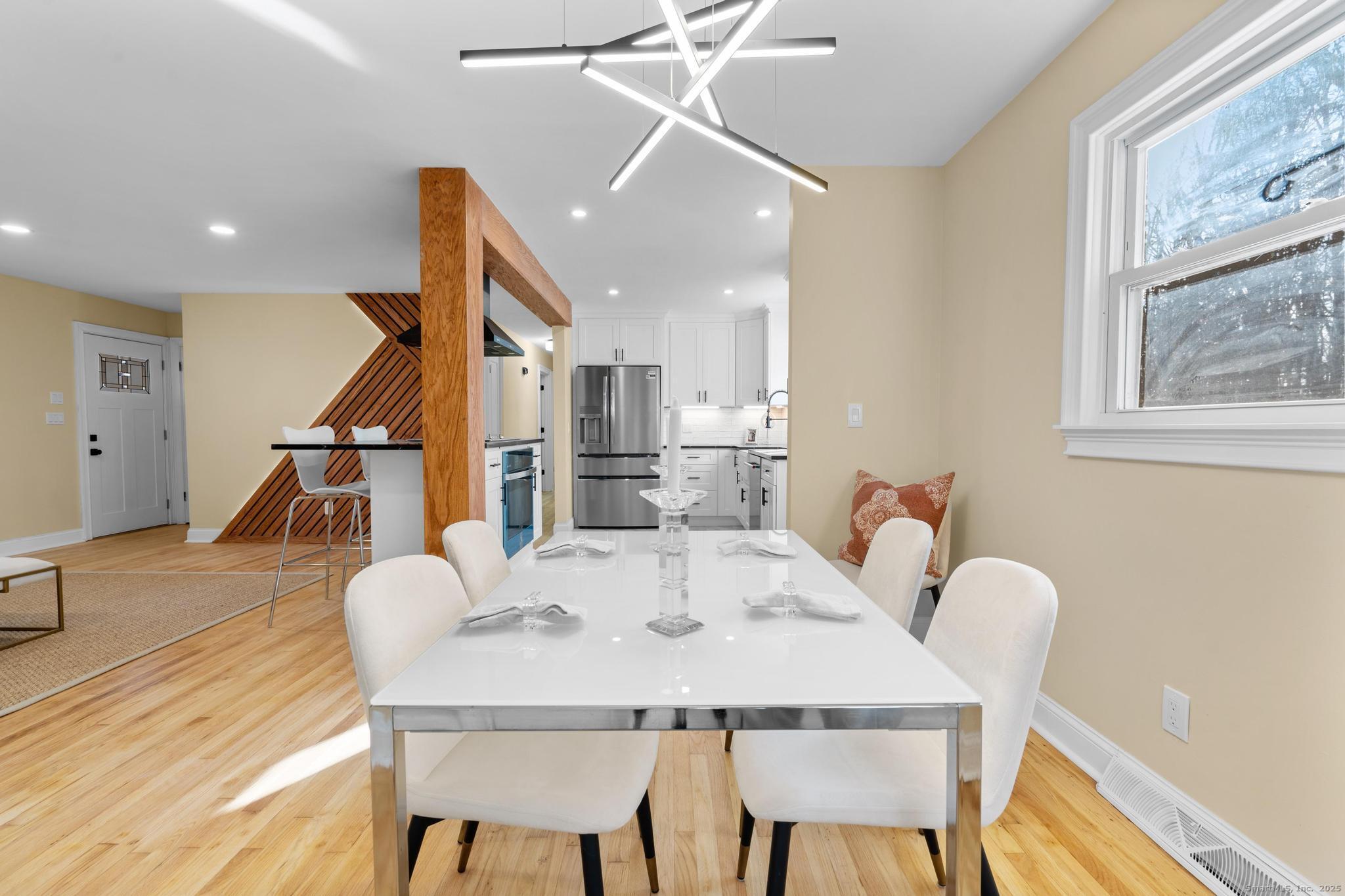 24 Evergreen Road North Branford, CT 06472 - Photo 8 of 31 a view of a dining room with furniture and wooden floor