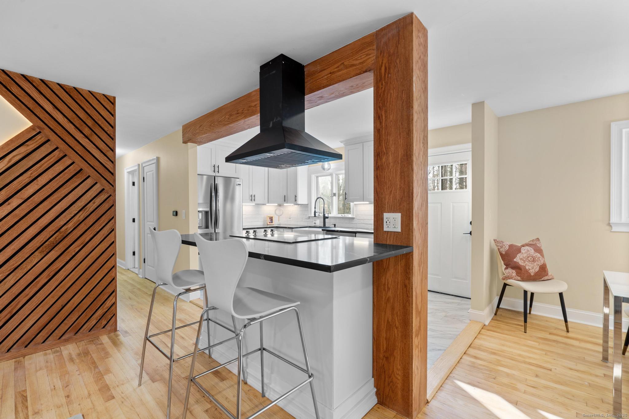 24 Evergreen Road North Branford, CT 06472 - Photo 9 of 31 a kitchen with stainless steel appliances kitchen island a chandelier