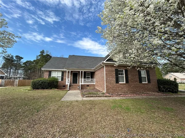 front view of house with a yard