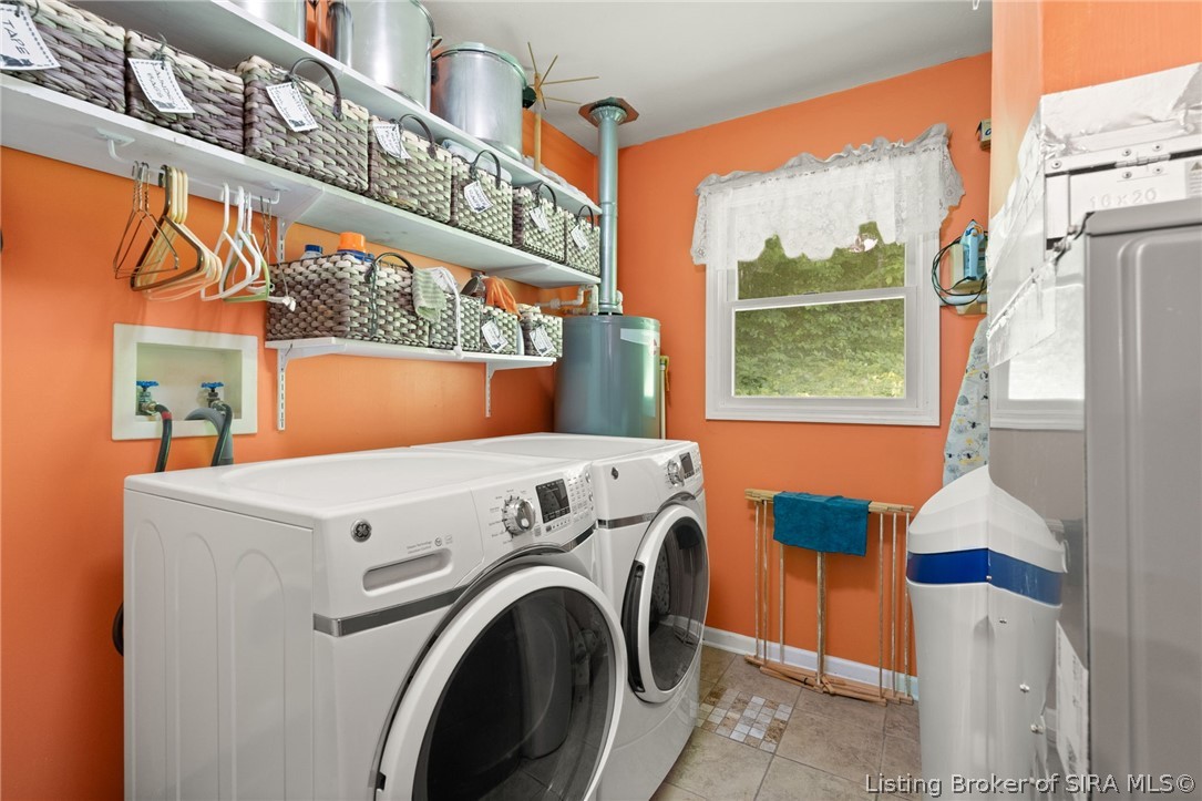 2394 West Old Felker Road English, IN 47118 - Photo 51 of 65 Laundry room on main level with storage shelves