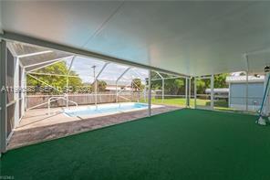 1063 Mayford Lake Road Moore Haven, FL 33471 - Photo 29 of 39 a view of swimming pool from a big yard