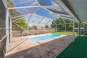 1063 Mayford Lake Road Moore Haven, FL 33471 - Photo 30 of 39 a view of a backyard