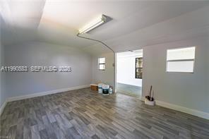 1063 Mayford Lake Road Moore Haven, FL 33471 - Photo 34 of 39 a view of empty room with wooden floor and fan