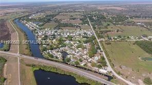 1063 Mayford Lake Road Moore Haven, FL 33471 - Photo 39 of 39 a view of a city from a terrace