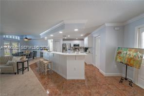 1063 Mayford Lake Road Moore Haven, FL 33471 - Photo 8 of 39 a view of kitchen with table and chairs