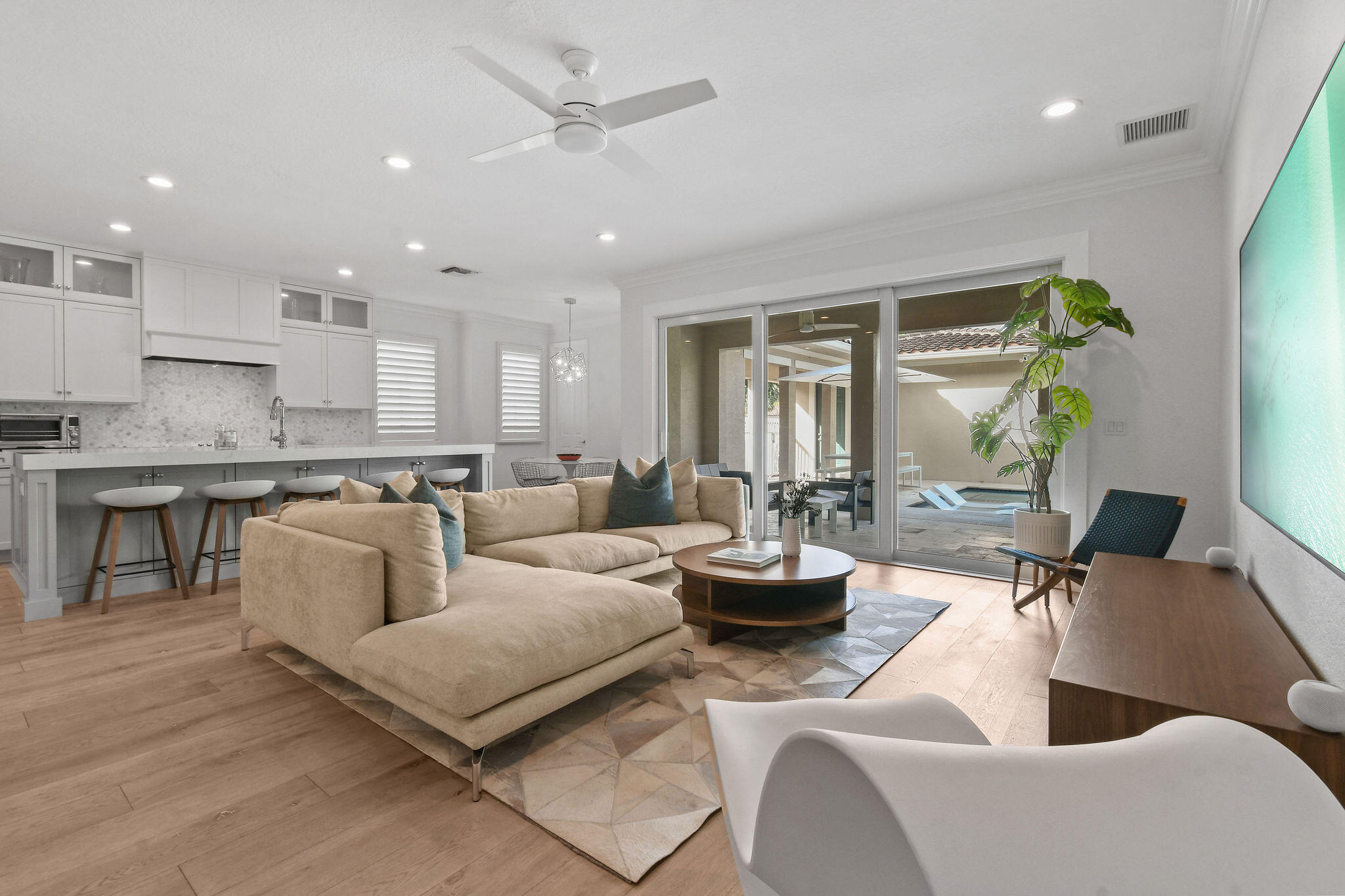 158 Ennis Lane Jupiter, FL 33458 - Photo 15 of 77 a living room with furniture and a large window