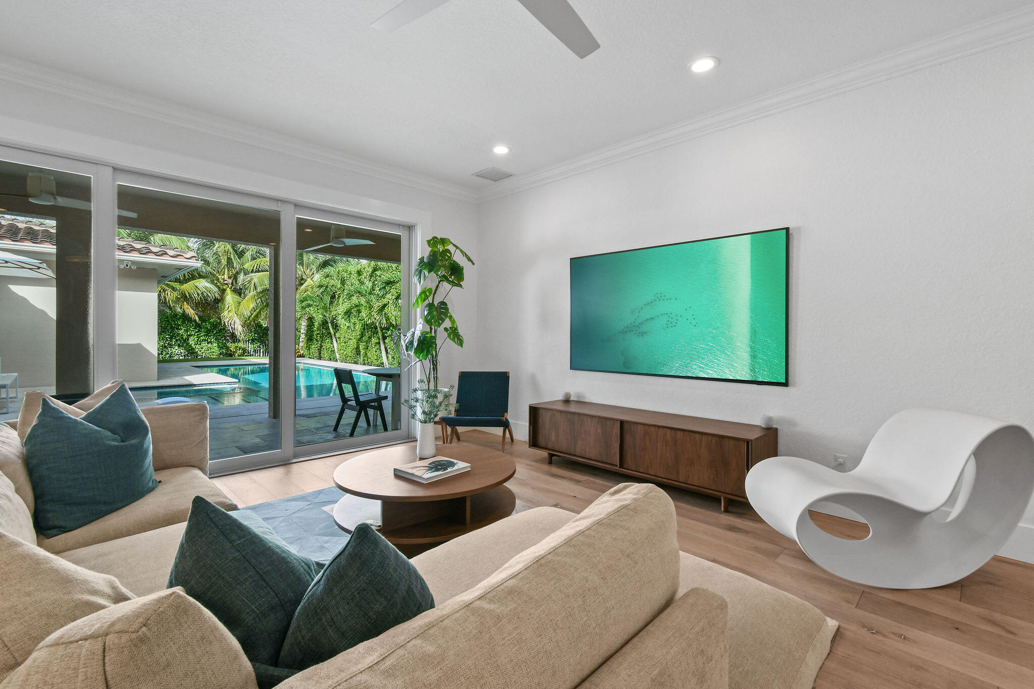 158 Ennis Lane Jupiter, FL 33458 - Photo 16 of 77 a living room with furniture and a flat screen tv