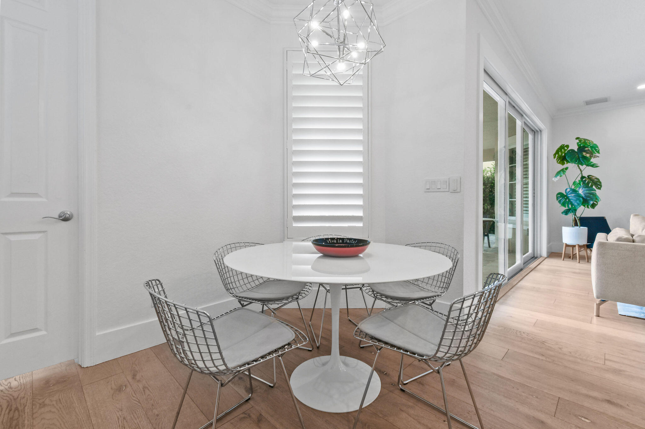 158 Ennis Lane Jupiter, FL 33458 - Photo 26 of 77 a view of a dining room with furniture and wooden floor