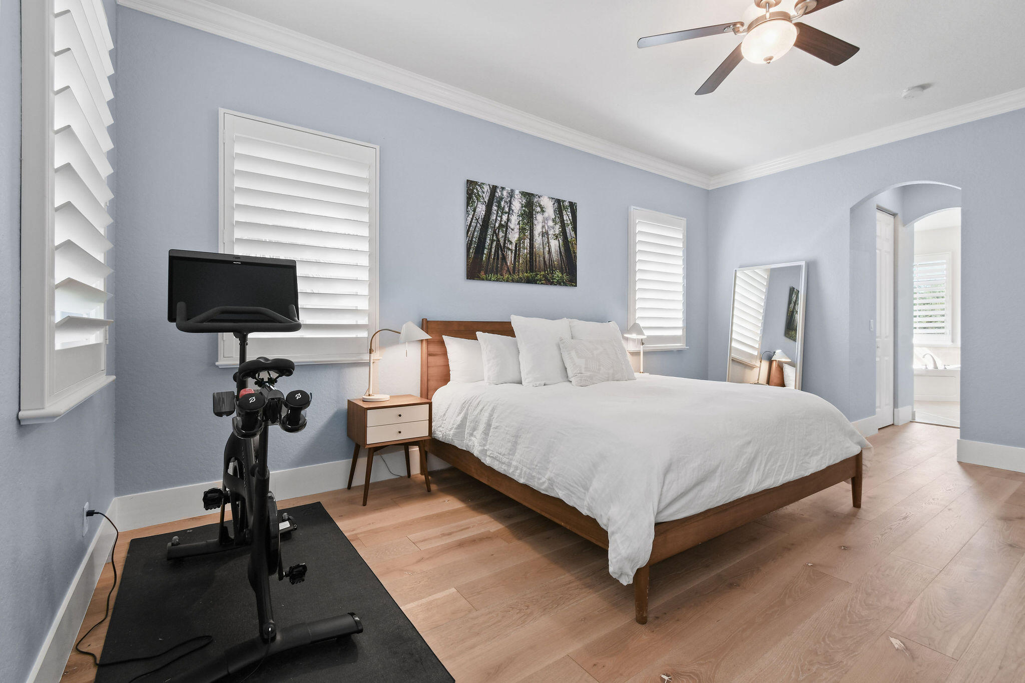 158 Ennis Lane Jupiter, FL 33458 - Photo 38 of 77 a bedroom with a bed and a chandelier