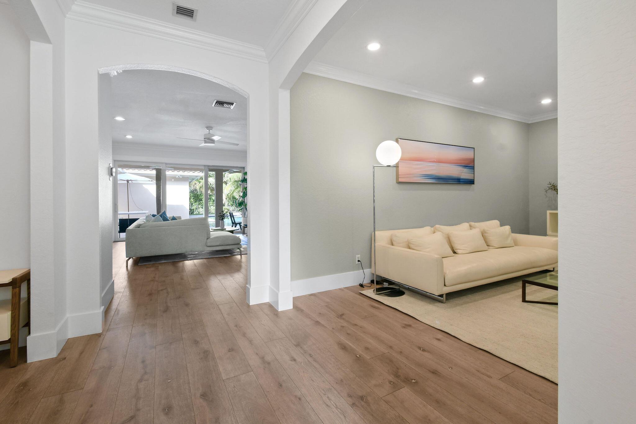 158 Ennis Lane Jupiter, FL 33458 - Photo 4 of 77 a living room with furniture and a flat screen tv