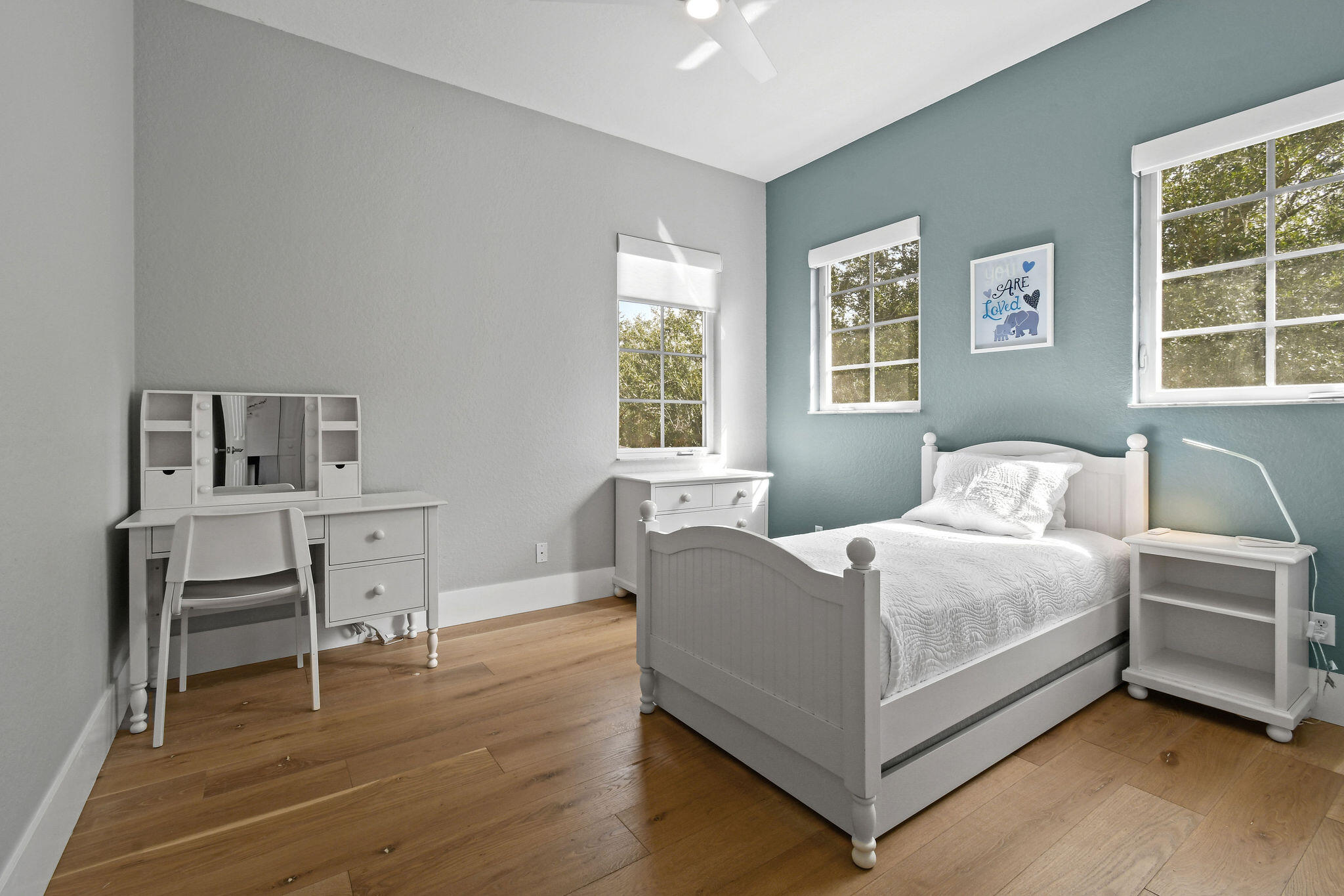 158 Ennis Lane Jupiter, FL 33458 - Photo 51 of 77 a living room with furniture and a window