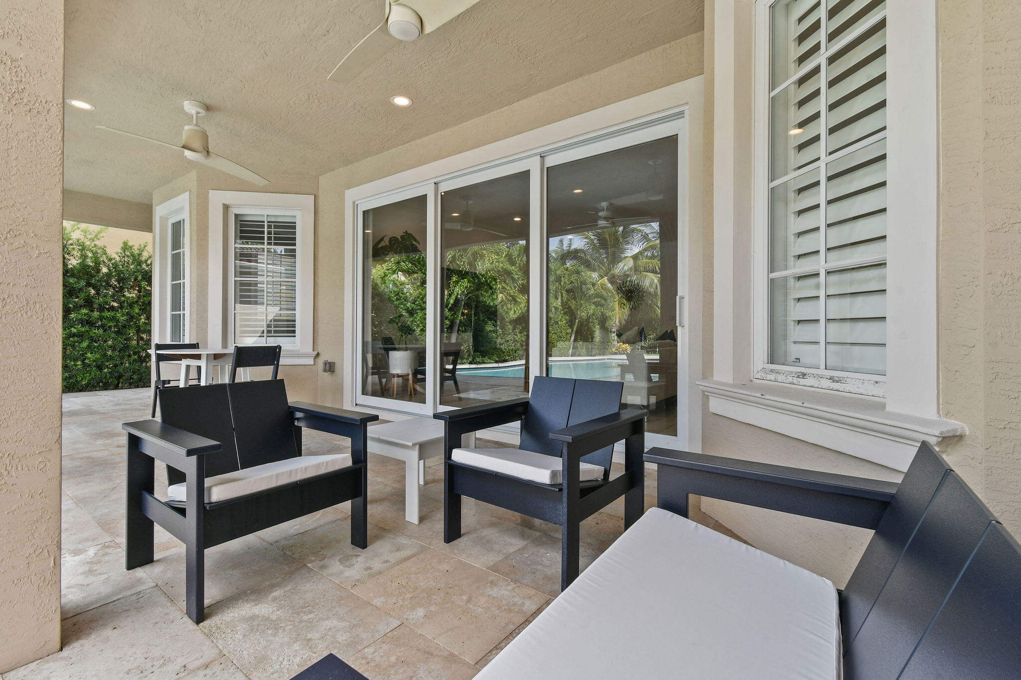 158 Ennis Lane Jupiter, FL 33458 - Photo 57 of 77 a living room with furniture and a potted plant