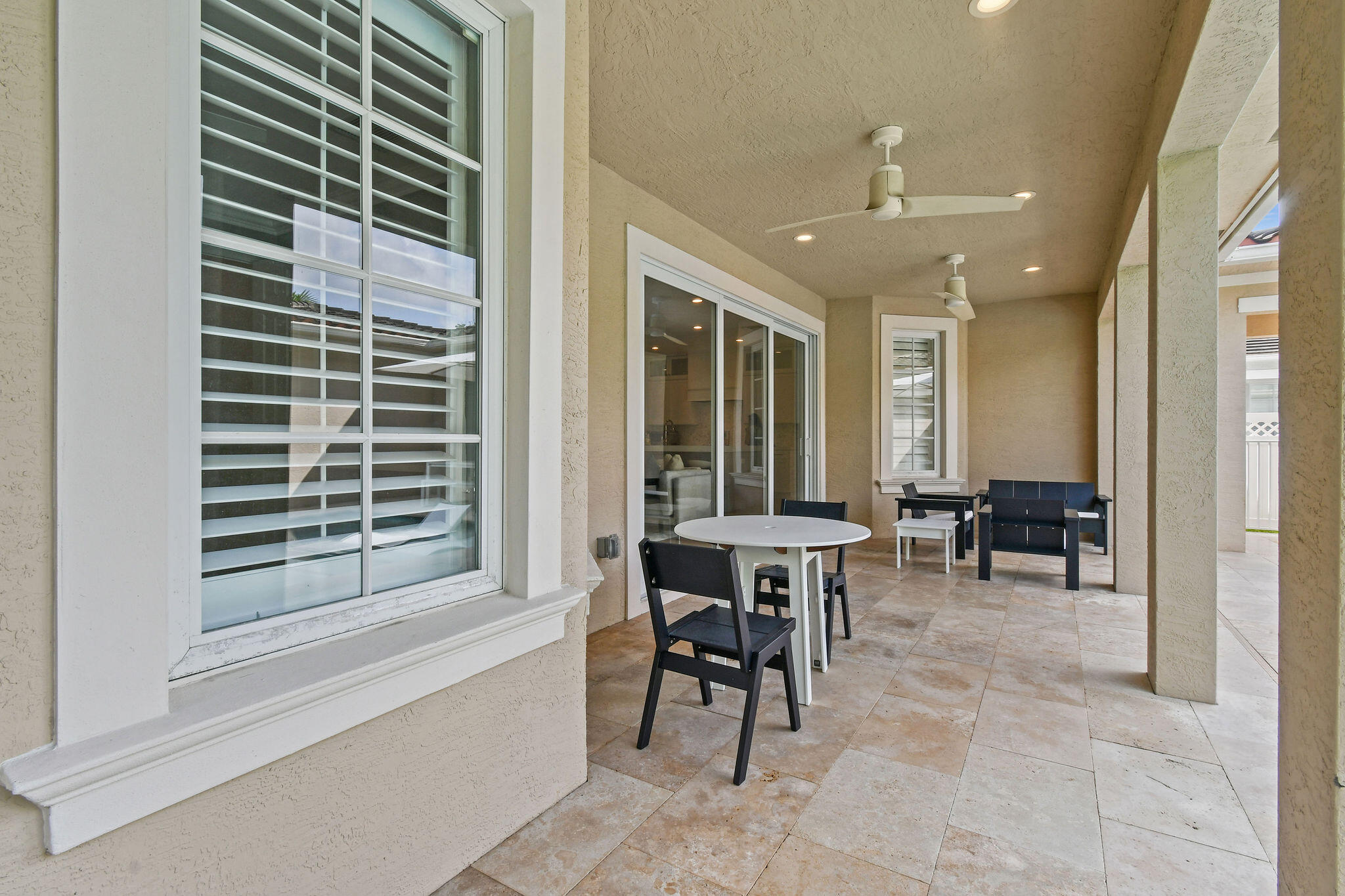 158 Ennis Lane Jupiter, FL 33458 - Photo 58 of 77 a view of livingroom with furniture and window