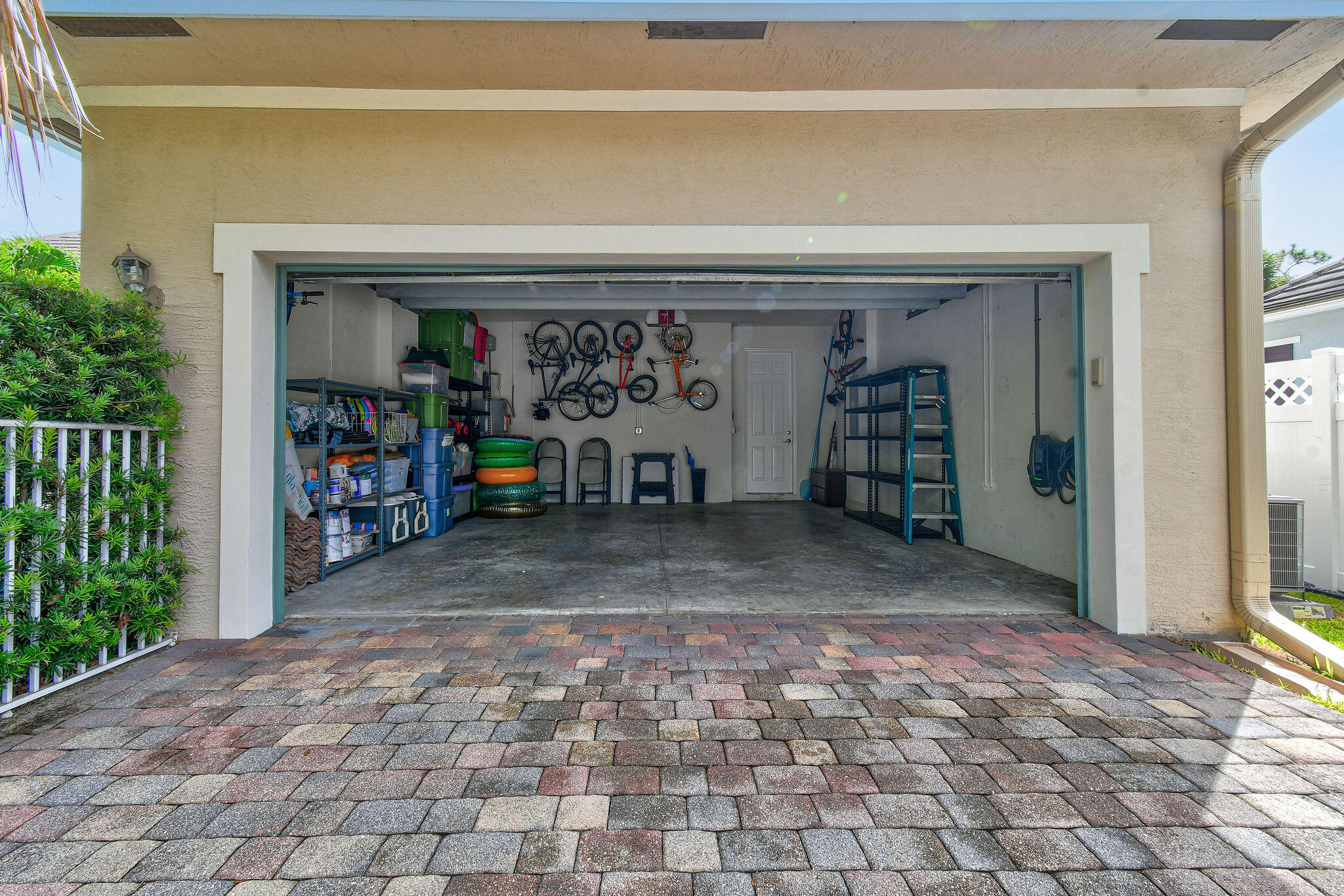 158 Ennis Lane Jupiter, FL 33458 - Photo 71 of 77 a view of a garage with rack