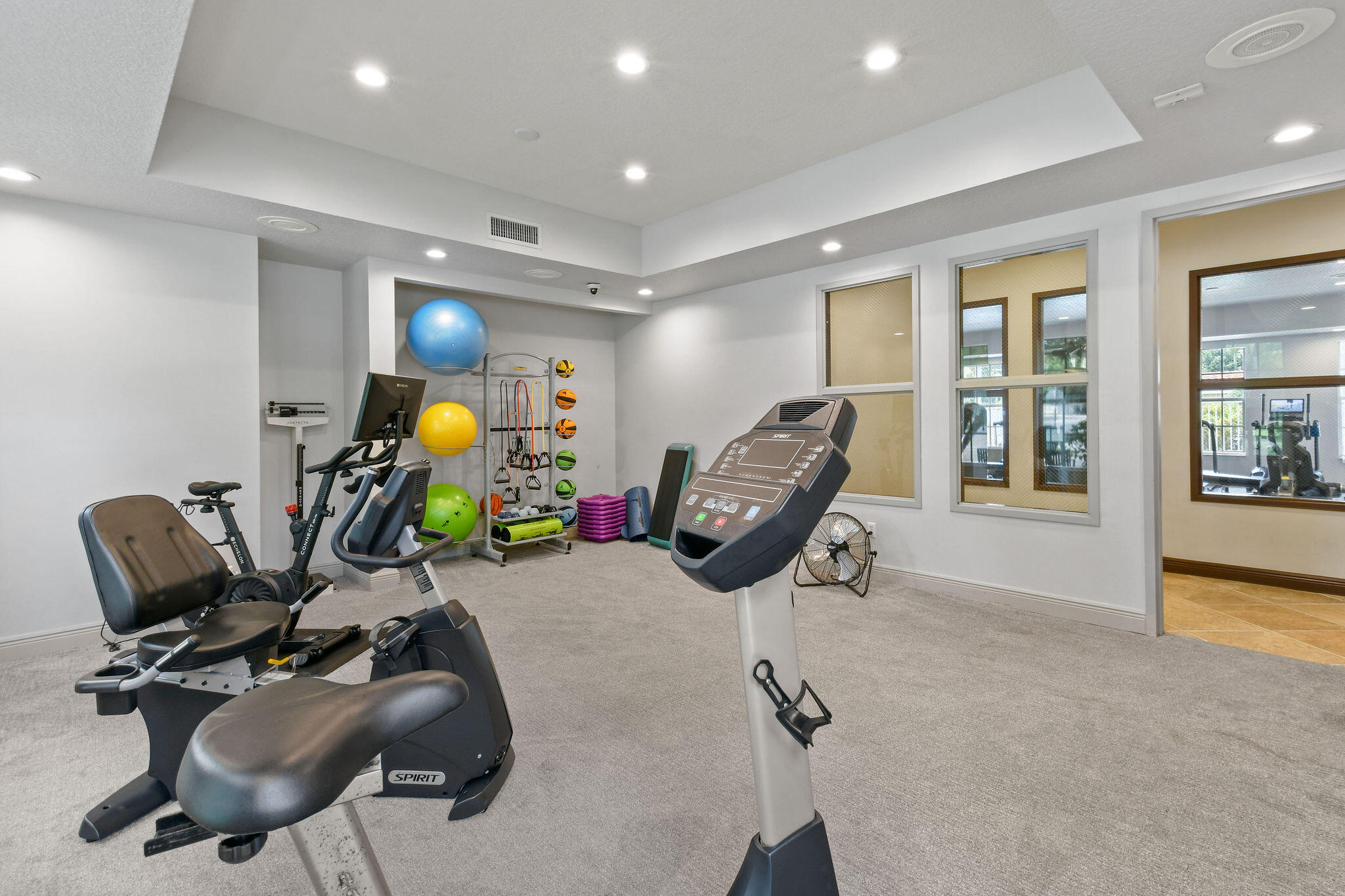 158 Ennis Lane Jupiter, FL 33458 - Photo 76 of 77 a view of a room with gym equipment