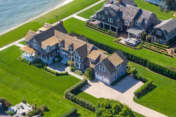 an aerial view of a house with a garden