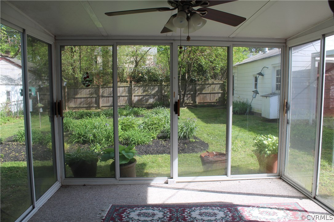 2426 Kenmore Road Henrico, VA 23228 - Photo 23 of 27 a living room with a floor to ceiling window and floor to ceiling window