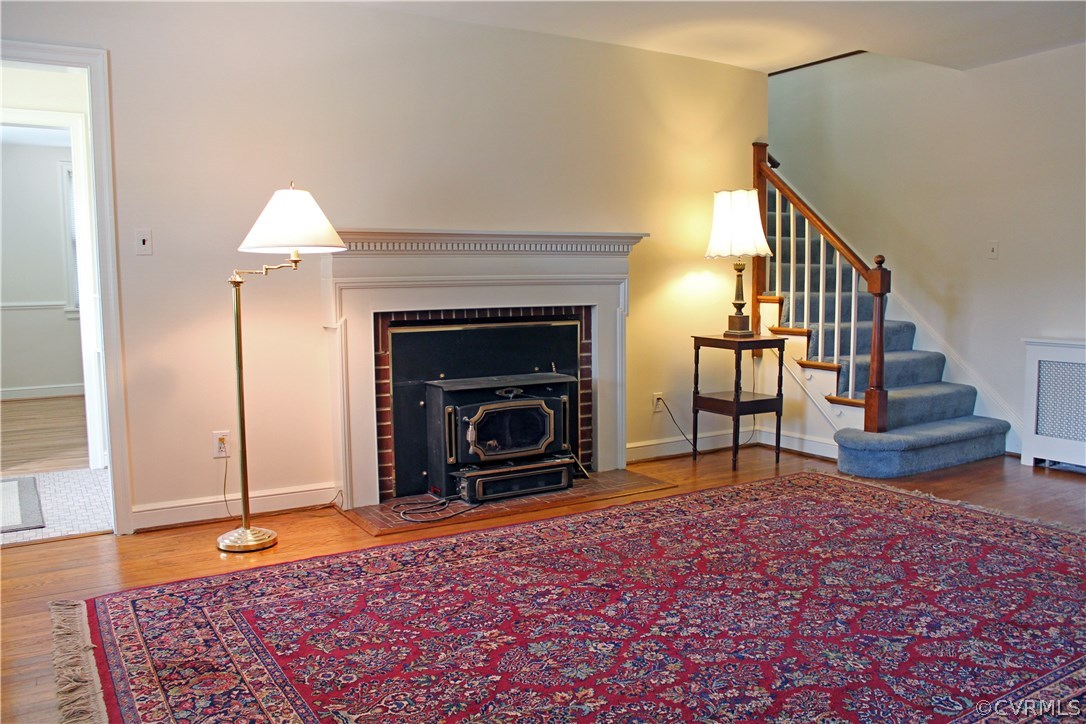 2426 Kenmore Road Henrico, VA 23228 - Photo 3 of 27 a living room with furniture and a fireplace