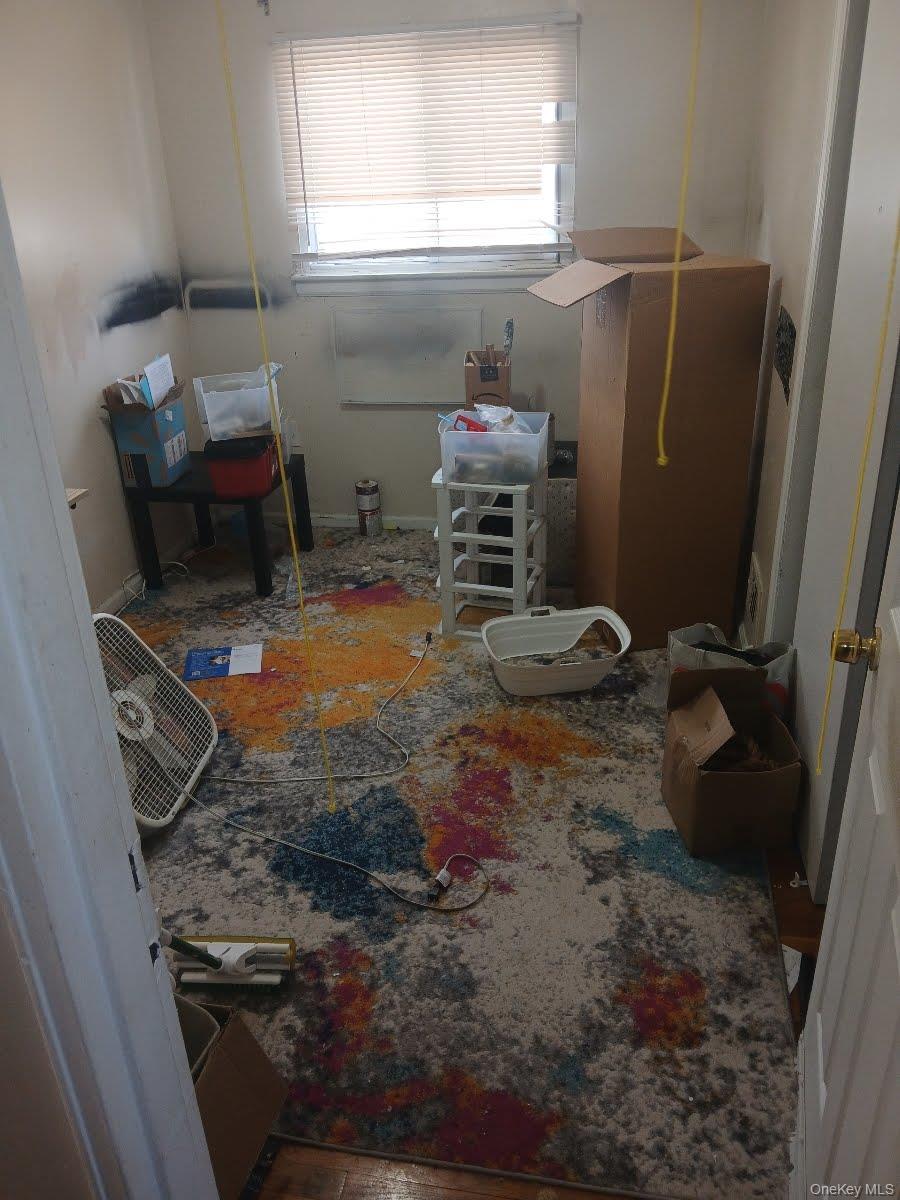 255-29 149th Road Queens, NY 11422 - Photo 16 of 23 a room with water heater and window