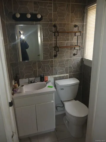 a bathroom with a toilet