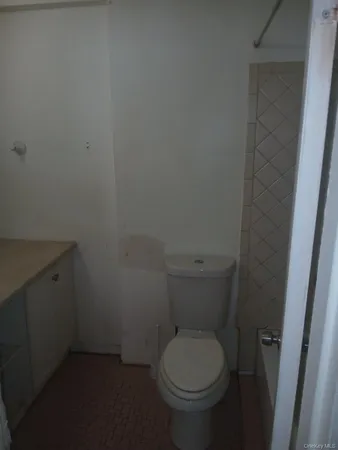 a bathroom with a toilet