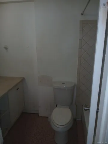a bathroom with a toilet