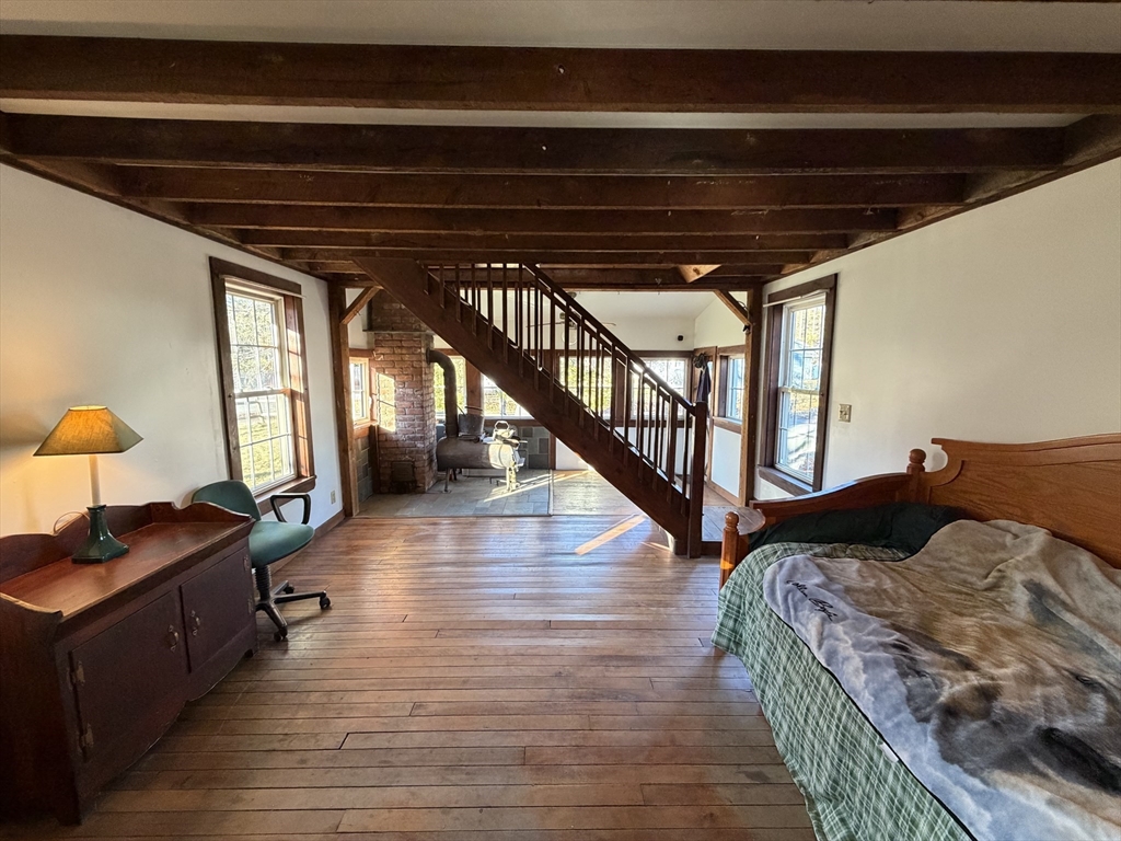 130 Laurel Street Greenfield, MA 01301 - Photo 15 of 31 a view of a livingroom with wooden floor and furniture