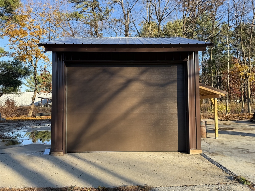 130 Laurel Street Greenfield, MA 01301 - Photo 9 of 31 a side view of a house with a outdoor space
