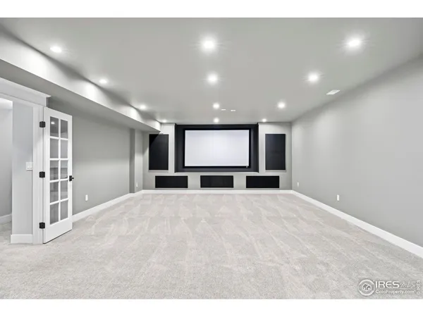 a kitchen with a table and chairs in it