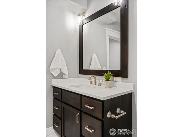 a view of walk in closet with living room