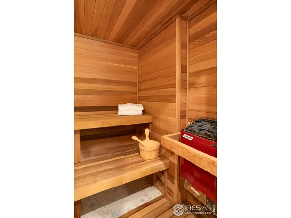 a view of an outdoor dining space with a table and chairs