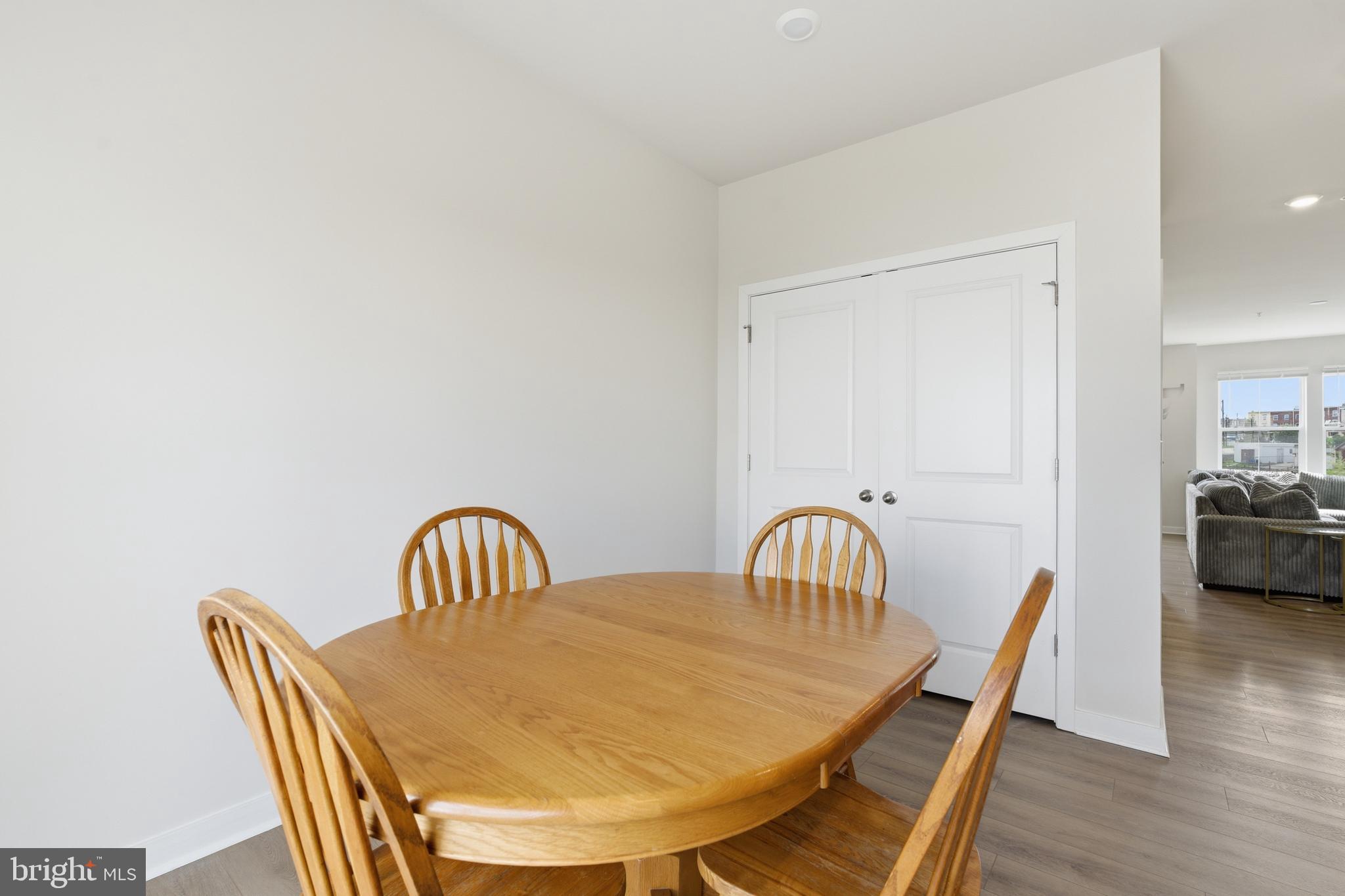 65 East Front Street Bridgeport, PA 19405 - Photo 20 of 49 a view of a dining room with furniture and wooden floor