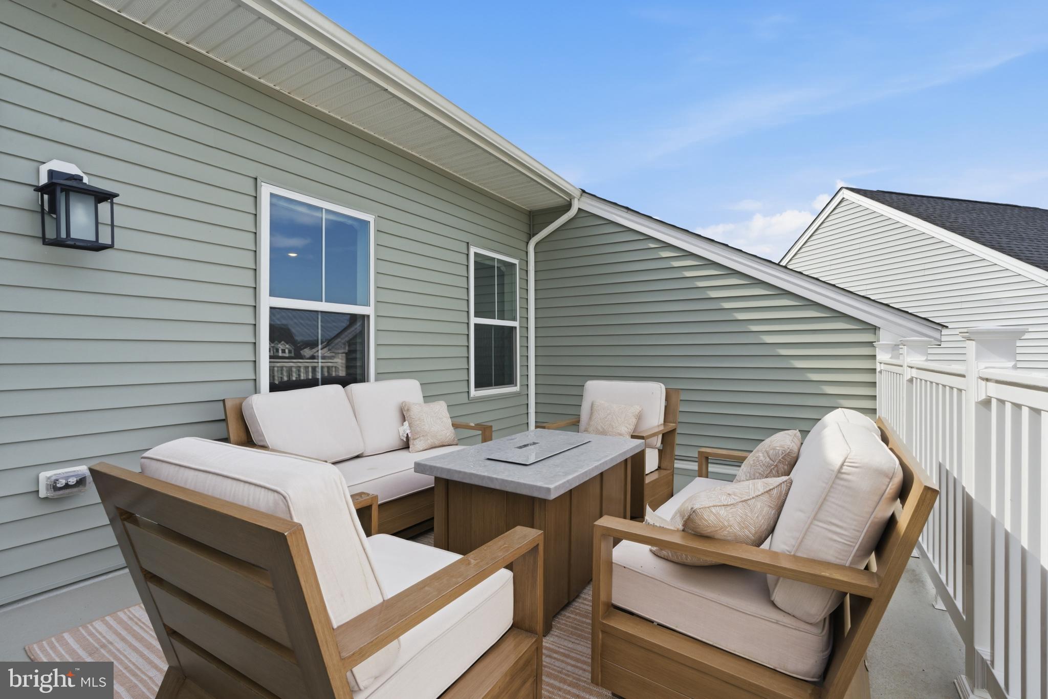 65 East Front Street Bridgeport, PA 19405 - Photo 45 of 49 a view of a patio with a table and chairs
