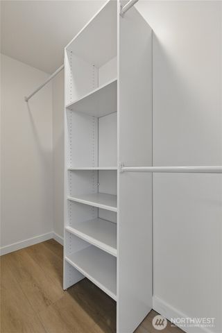 a view of an empty walk in closet