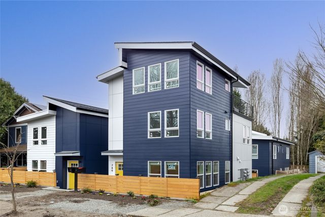 a front view of residential houses