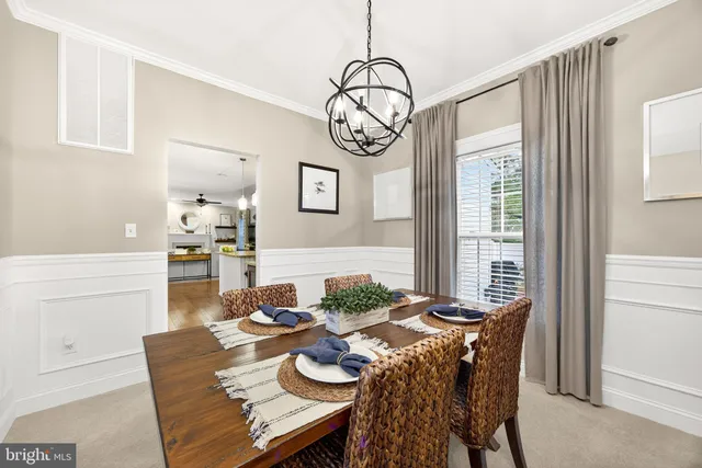 a kitchen with stainless steel appliances granite countertop a stove a sink dishwasher a microwave oven with granite countertops and cabinets